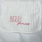 Personalized white baby burp cloth with embroidered first and middle names — "Berri" in pink block letters and "james" in darker pink script font. Custom baby gift on soft muslin fabric, perfect for newborns, baby showers, and keepsakes.