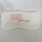Personalized white baby burp cloth with embroidered first and middle names — "Berri" in pink block letters and "james" in darker pink script font. Custom baby gift on soft muslin fabric, perfect for newborns, baby showers, and keepsakes.