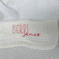 Personalized white baby burp cloth with embroidered first and middle names — "Berri" in pink block letters and "james" in darker pink script font. Custom baby gift on soft muslin fabric, perfect for newborns, baby showers, and keepsakes.